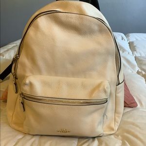 White leather Coach backpack